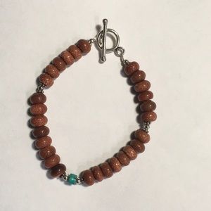 Sterling and Goldstone Rhondele Toggle Bracelet. EUC.